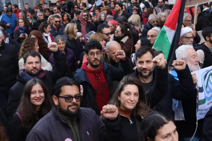 Palestinians solidarity march in Buenos Aires protesting Gaza genocide.