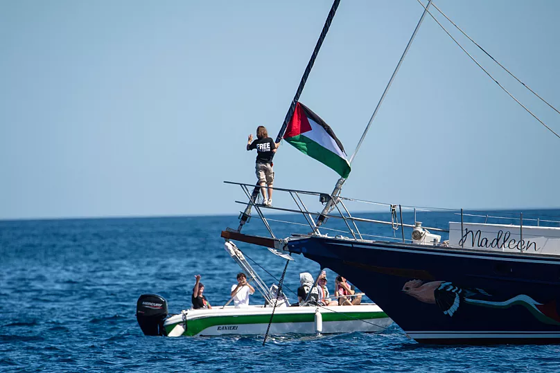 Global Sumud Flotilla sails toward Gaza as European naval forces provide protection amid rising regional tensions.