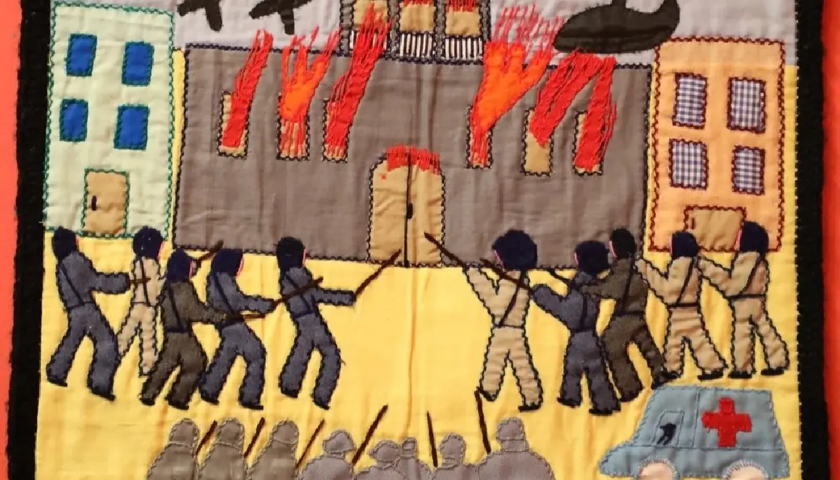 Storming and bombing of the presidential palace, La Moneda, on September 11, 1973. Arpilleristas: E.M. and F.D.D. Photo: Museum of Latin American Art.