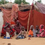 (FILE) Displaced families shelter at a gathering site in El Fasher in northern Darfur in August 2025. Photo: United Nations.
