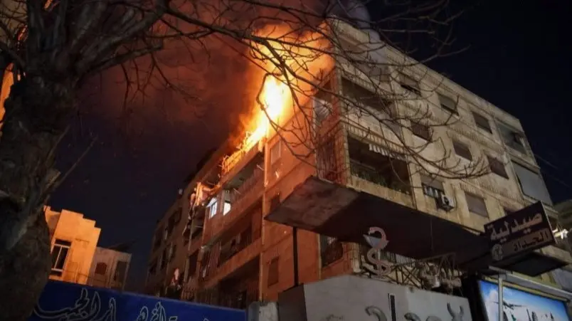 Flames rising from a building after clashes broke out between Syrian army and Kurdish-led SDF in neighborhoods of the northern Syrian city of Aleppo. Photo. SANA.