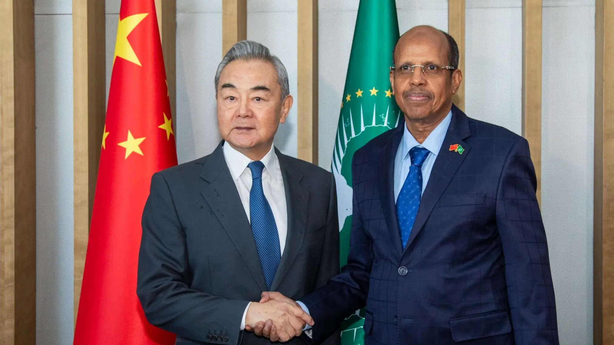 Chinese Foreign Minister Wang Yi and African Union Commission Chairperson Mahmoud Ali Youssouf. Photo. AU.