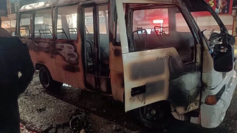 (FILE) A public transport vehicle set on fire by protesters in the city of Ilam, western Iran, on January 6, 2025. Photo: IRNA.