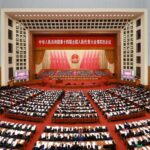 Delegates attend the opening session of China’s top political advisory body at the Great Hall of the People in Beijing.