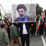 An Iranian man holds a portrait of Mojtaba Khamenei, son of the late Supreme Leader Ayatollah Ali Khamenei, during the 47th anniversary celebrations of the Islamic Revolution in Tehran, Iran, 11 February 2026 (issued 09 March 2026). Iran's Assembly of Experts has appointed Mojtaba Khamenei to replace his father as the country's new supreme leader, according to state media. Photo: EFE.