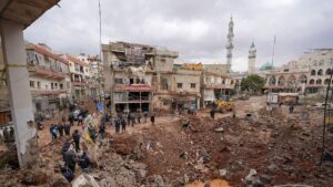 Iran War Day 15 captured through smoke over Kharg Island after US strikes on oil facilities.