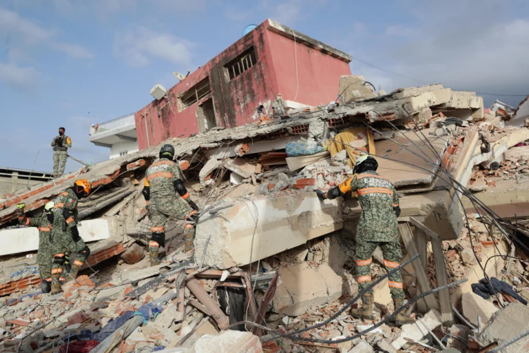 Venezuela earthquake prayer day aid center at parish