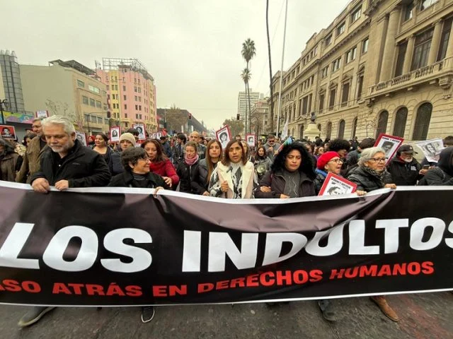 Chile human rights protest, Santiago march, José Antonio Kast government, dictatorship crimes, presidential pardons, Fabiola Campillai, La Moneda, human rights organizations