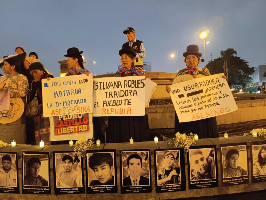 Families of victims protest outside Lima's Palace of Justice against Keiko Fujimori, demanding justice and the repeal of laws they say promote impunity.