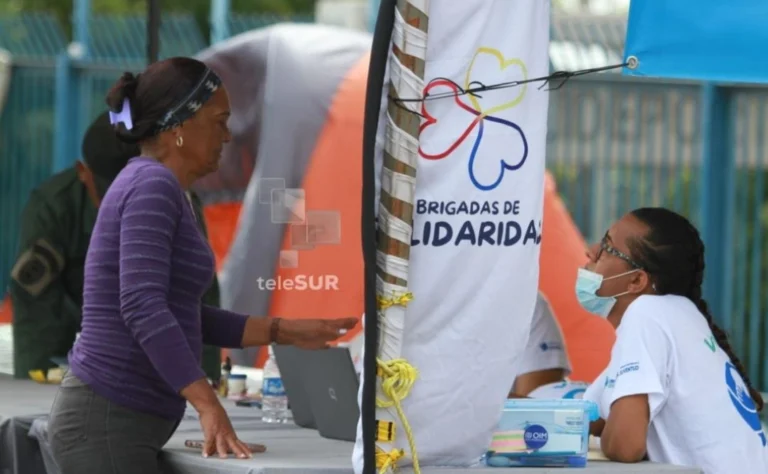 Venezuela earthquake response, humanitarian assistance, transitional camps, displaced families, aftershocks, rescue operations, food distribution, structural damage.
