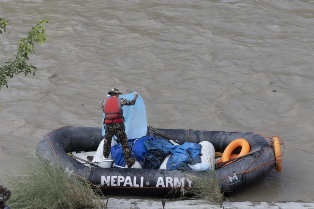 Rescue teams search for missing people after floods and a glacier collapse near the Nepal-China border.