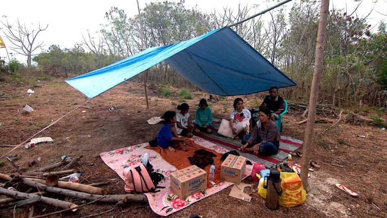 Displaced residents at evacuation centers on Flores island after a deadly 7.7-magnitude earthquake in Indonesia