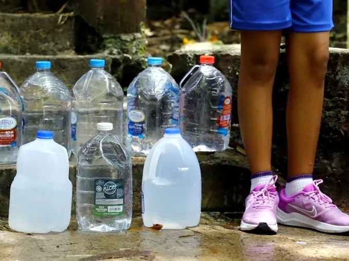 Puerto Rico water rationing amid drought as residents collect water from tanker trucks