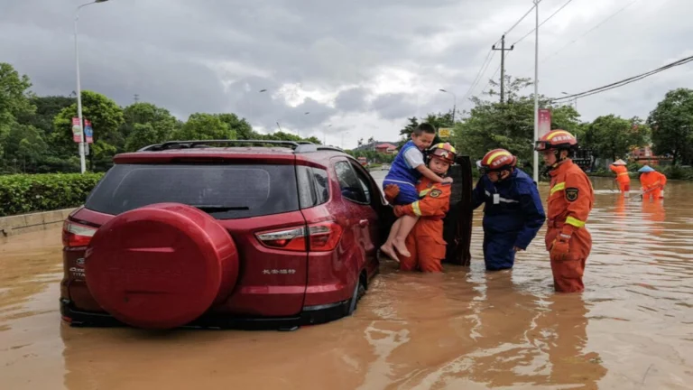 Typhoon Narra flooding in Guangxi China as rescue teams evacuate residents and thousands remain in temporary shelters.