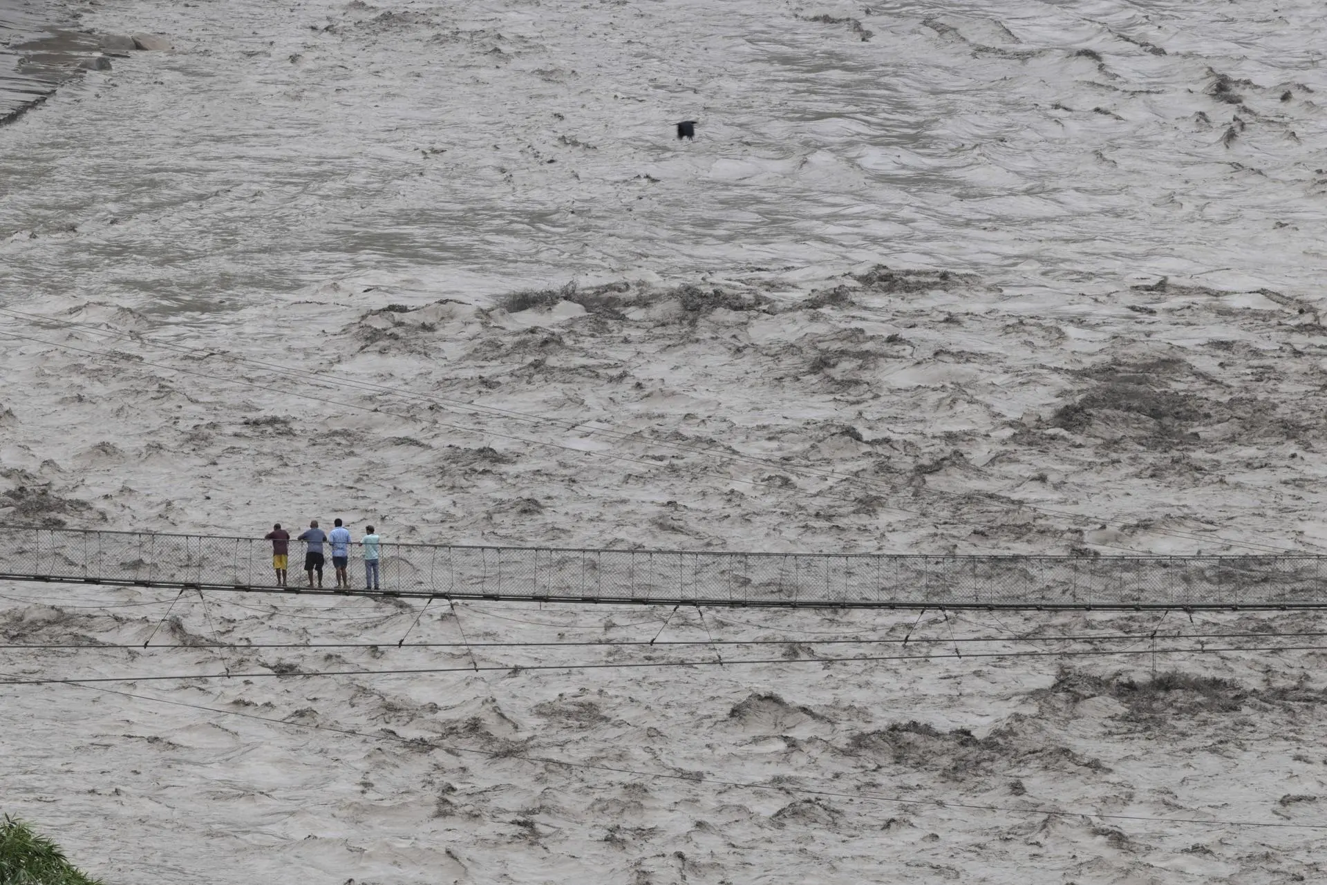 Rescue teams working amid flooding, landslides and heavy rain in Nepal after a deadly flood disaster.
