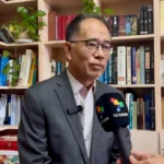 Liu Baocheng, professor at the University of International Business and Economics (UIBE) and Director of the Center for International Business Ethics, during an interview with teleSUR in Beijing. Photo: Bruno Falci / teleSUR.