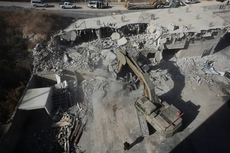 AI surveillance technology monitoring Palestinian land and buildings in the occupied West Bank