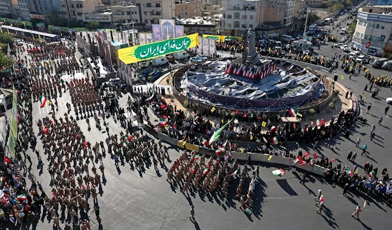 Participants march in Tehran during the Fedayeen for Iran military and popular maneuver