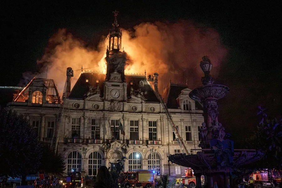 Fire damage at Limoges town hall after nationwide protests in France led to arrests, clashes and looting.